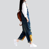Jeans-Jumpsuit mit gelbem Saum für Damen